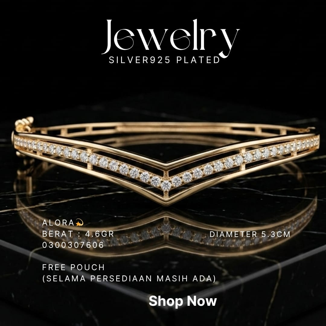 Gelang perak 925 model Alora bangle warna gold berbentuk V dengan zirkonia di atas marmer